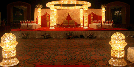 Bright red stage beautifully illuminated with a circle of light above the stage