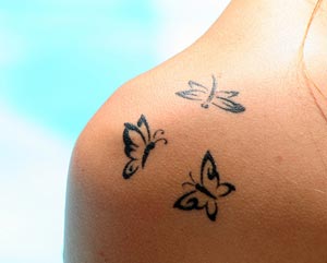 Butterfly tattoo on shoulder back