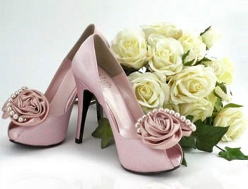 Pretty Pink high heel shoes decorated with a rose & pearl.
