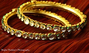 Bangles with white stones studded