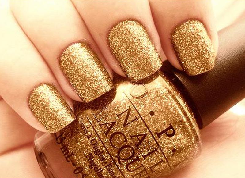 4. Gold glitter nail polish - wide 5
