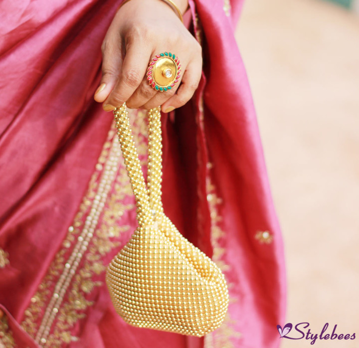 Indian attire with golden accessories