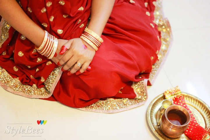 Karvachauth pooja in red and golden saree
