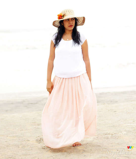 Loose top with maxi skirt on a beach
