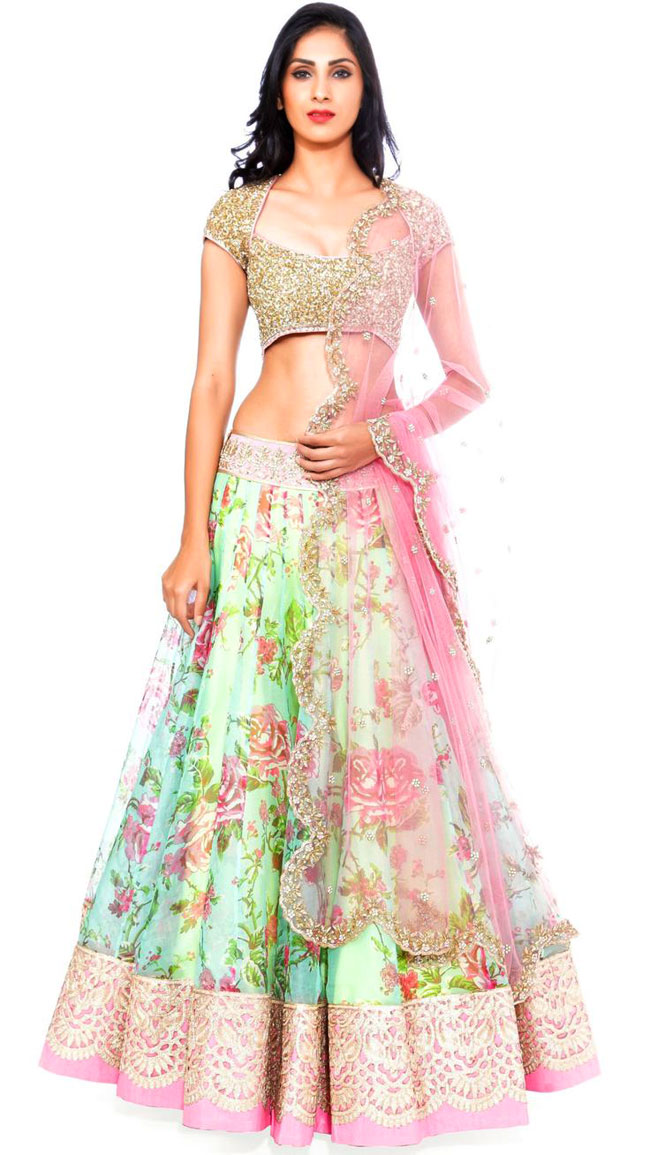 Pink and green floral print lehenga with golden choli