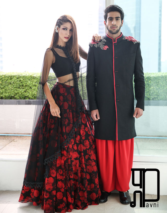 Red and black floral print lehenga with a net cape