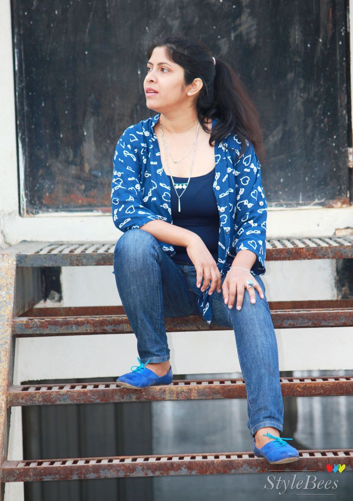 Blue jeans with blue t-shirt and shirt and shoes