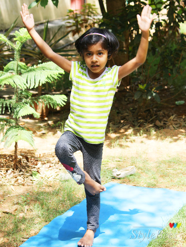 My daughter trying out Suryanamaskar